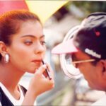 Kajol Instagram - Throwback to Ishq..... Big phones, sitting on set all day coz we had no vans and the rooms were too far away to keep going to and we still worked 14 hours heat rain or shine ... and looked good . All nineties people agree ? What say @ajaydevgn @iamsrk @_aamirkhan @iamjuhichawla