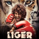 Karan Johar Instagram - Proud to present LIGER, starring the ruler of big screens and many hearts - Vijay Deverakonda & the fiery Ananya Panday. Directed by the exceptionally skilled Puri Jagannadh, we can't wait to let the world witness this story in 5 languages - Hindi, Telugu, Tamil, Kannada & Malayalam. See you at the big screens! #Liger #SaalaCrossbreed @thedeverakonda @ananyapanday #PuriJagannadh @charmmekaur @apoorva1972 @ronitboseroy @meramyakrishnan @iamVishuReddy @dharmamovies @puriconnects