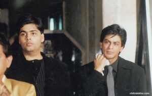 Karan Johar Instagram - I think bhai @iamsrk is sweating thinking of how to break the news to me that I need to hit a treadmill! #throwbacksaturday ! Meanwhile my expression is a result of discomfort from overeating!