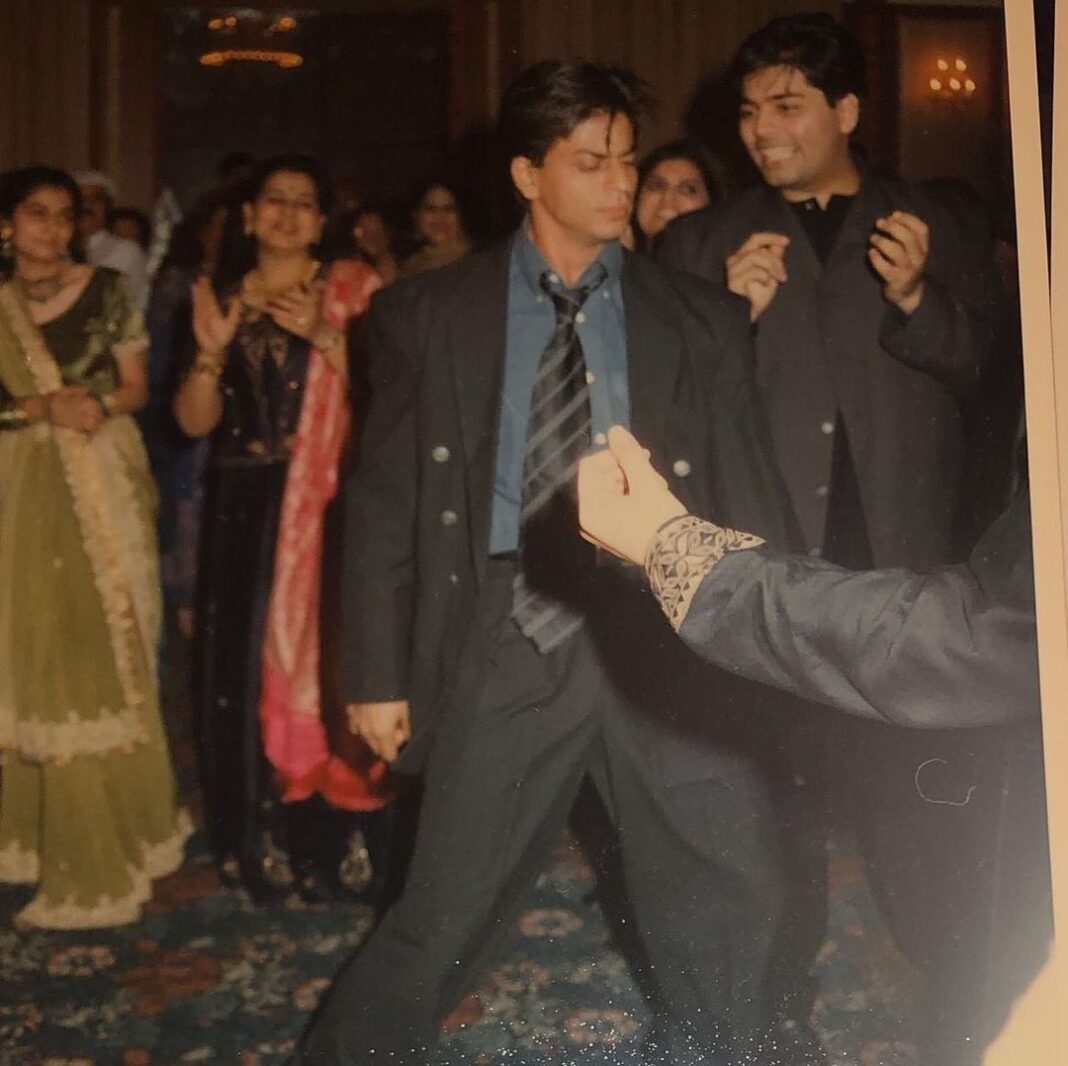 Karan Johar Instagram - Throwback to @sanjaykapoor2500 and @maheepkapoor ‘s sangeet! The superstar shakes a leg and don’t miss the out of sync background dancer! #throwbacktuesday