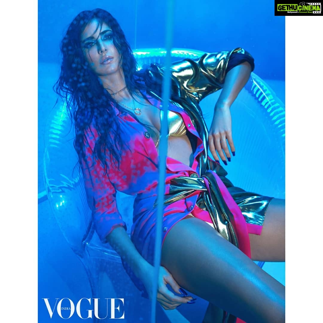 Katrina Kaif Instagram - Golden Hour✨ #Vogue #November2019 issue. Photographed by Greg Swales (@gregswalesart). Styled by Anaita Shroff Adajania (@anaitashroffadajania). Hair: Yianni Tsapatori (@yiannitsapatori). Makeup: Daniel Bauer (@danielcbauer). Dress, Fausto Puglisi. Metallic bikini, ASOS. Choker, necklace with pendant; both Outhouse. Swing, Claraacrylic.com Makeup Credits: Kay Beauty @kaybykatrina Eyes - Kay Beauty Smokey Kajal Brows - Kay Beauty Brow Pencil in Hazelnut Lips - Kay Beauty MATTEinee Lipstick in Melodrama Kay Beauty Lip Topper in Show Stopper