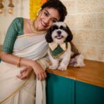 Keerthy Suresh Instagram - From my baby boy @iamnyke and I to all of you, Happy Onam! 🛶🐶 PS - Swipe till the end to see what Nyke is up to while I think he’s posing 😂 #NykeDiaries #Onam2021 #Onam