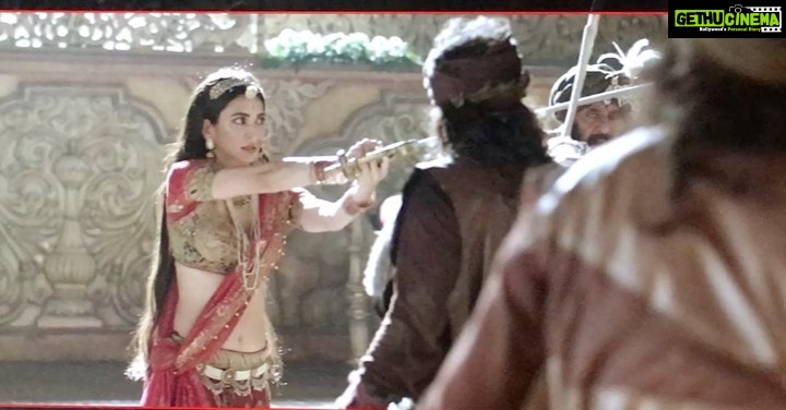 Kriti Kharbanda Instagram - Throw back to one of my toughest days at work, and also one of the most cherished. A lot of People said, I’m too “thin” and “tiny” to even carry a sword, let alone fight. Ahem, ahem :) here’s a little treat for ya, don’t mess with #rajkumarimeena :) #housefull4 #throwback #bestdayever