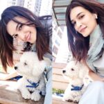 Kriti Sanon Instagram - Bright sunny morning with Disco!! Cool gentle breeze, sunlight, a swing with grass all around, some music in my Airpods and a toy to play for him🐶.. thats all we need!! 🌞☘️🍀🎧🎼#whocaresitsmonday