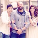 Kriti Sanon Instagram - I justtt loovvveee this pic!! Me and @varundvn clinging onto rohit sir's arms like kids! 😂😁😁