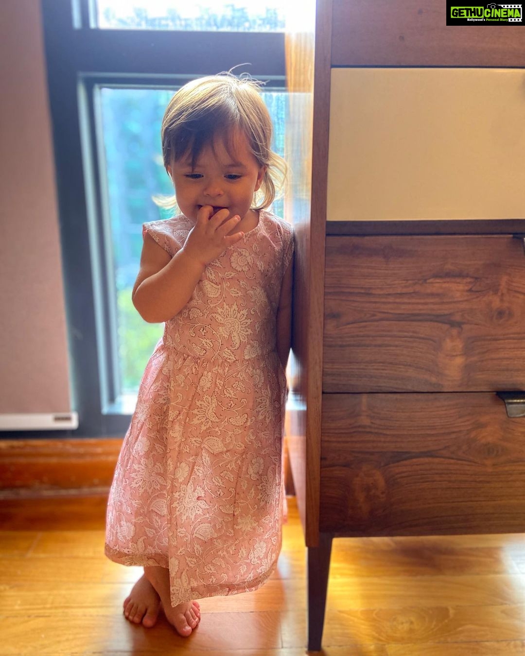 Lisa Ray Instagram - @ferozadesigns made our day sending over the sweetest handblockprinted dresses for mommy and Soufflé in feathery light cotton, perfect for Singapore weather but with echoes of India. We decided to pay forward this kindness- this morning Sufi and Soleil said a little prayer for everyone on this blue marble we call home. I’m sharing these pictures of Soleil posing and proofing mom’s work 🙈 rocking her @ferozadesigns summer frock. Stay safe everyone. Now is the time to activate love, creativity and kindness: Super Powers accessible to each of us. The hero 🦸♀️ lives within ✌🏼