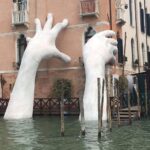 Lisa Ray Instagram - Lorenzo Quinns giant hands sculpture emerging from a Venice Canal. It seems clear we need loud and consistent reminders of our climate change crisis and so here’s another.
