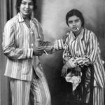 Lisa Ray Instagram – Repost from @nupurasthana using @RepostRegramApp – Such an intriguing story…. One day in 1937, two young long-haired women in saris stepped into a small photo studio in Madras. They changed into striped pyjama suits and struck a pose in front of the studio camera. One of them leaned languidly against a chair, while the other’s eyes focused on something outside the frame. Both of them held cigarettes.
 The world-renowned Carnatic vocalist MS Subbulakshmi and the legendary Bharatanatyam dancer Balasaraswati were just having a bit of fun. “The two teenaged friends both became world-famous artists,” wrote Douglas Knight J in the biography Balasaraswati: Her Art & Life. “From strictly disciplined households, the two asserted their independence by secretly arranging this photograph of themselves dressed outrageously in Western-style sleepwear and pretending to smoke cigarettes.” This iconic photograph was first made public only 73 years later, in the 2010 biography of Balasaraswati penned by her son-in-law Douglas Knight J. By this time, the successful careers of these artists were so highly revered over decades, almost deified, that this picture quite suddenly threw light on a whole new aspect of their lives – just two young friends attempting to do something unconventional.
According to TJS George’s biography M.S. Subbulakshmi: The Definitive Biography, Subbalakshmi’s career and public image was steered and moulded by Sadashivam, her husband and mentor, from that of a talented young devadasi – a community that has traditionally taken to performing arts – to an the ideal, devout Brahmin wife.

While Balasaraswati followed the matrilineal traditions of the devadasis by staying with her extended family in her original home, and taking a partner who also supported her art, this was not the case with Subbulakshmi. Nevertheless, both of them went on to be lifelong friends.