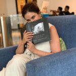 Lisa Ray Instagram - Ready to read from @closetothebone.book @cowrks co-hosted by #BrokeBibliophiles Bombay Chapter and Sanskaari Girls Book Club. Jason came along for the ride, he’s NOT reading my book, and covertly keeping track of the match score. Wearing @jamesferreiralabel Styled by @dipikablacklist MUH @myrrajainmua (Flipping through your evocative book @soon_i) Thank you for my delicious stash of books. Special thanks to #amishtripathi for my signed copies and best wishes for the launch of Raavan Thank you @ekcupcoffee for inviting me