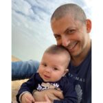 Lisa Ray Instagram - We are sandy in strange places but exhilarated from Souffle’s first day at the beach...and how hot is hubby with his buzz cut?