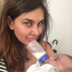 Lisa Ray Instagram - Juuuuust in case I’ve been giving off the impression that parenthood is all butterflies and cherubic, sweet smelling, chirping mini-mes, here’s a picture of me perfecting my hands-free chin bottle feed a few months ago in #Tbilisi so I can FaceTime my husband, check the currency in my wallet, take a selfie and type an entire chapter of my book without neglecting my child. I know, I forgot about combing my hair. I’m saving up for family therapy now. 😜 #parenthood #futureisfemalebaby #mysouffle #gottalaugh #letsgetreal #lovemygirls #multitaskingmom Tbilisi, Georgia