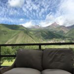 Lisa Ray Instagram - Glorious morning views from @rooms.hotels of Mount Kazbegi and the Gergeti Trinity Church perched precariously high in the shadow of the mountain. #mountaingirl #Georgia Rooms Hotel Kazbegi