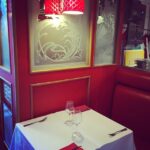 Lisa Ray Instagram - Love the cozy corner booth in classic bistro red. #France #InsightVacations