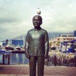 Lisa Ray Instagram - Visit to #Capetown is incomplete without a pilgrimage to #NobelSquare which honours South Africa's four Nobel Peace laureates. Strangely only #Madiba's attracts me most and were I a pigeon I'd chose the exact same spot. #Madiba I'm sure is grinning away somewhere. #Mandela #Capetown #SouthAfrica