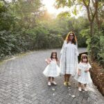 Lisa Ray Instagram - Honeyed moments with my girls. I grew up with a reverence for the natural world, which I’m trying to pass on in an age of iPads and Peppa Pig on demand amongst easy distractions. After just a few months in Mumbai, my girls are refusing to walk 🙈 I mean, this really freaks me out. Fortunately there’s @hilton_shillim just a few hours out of the concrete jungle, where we can all regulate our nervous systems to bird song and rustling leaves. ‘What’s that sound?’ my girls asked me last night when we lay on our backs on the grass, staring at the liquid night sky. ‘Crickets?’ I offered. ‘No, it’s quiet.’ Sufi replied. Thanks @itr_by_khyatipande for our dreamy, mindfully crafted, matching outfits. #ouralbumcover
