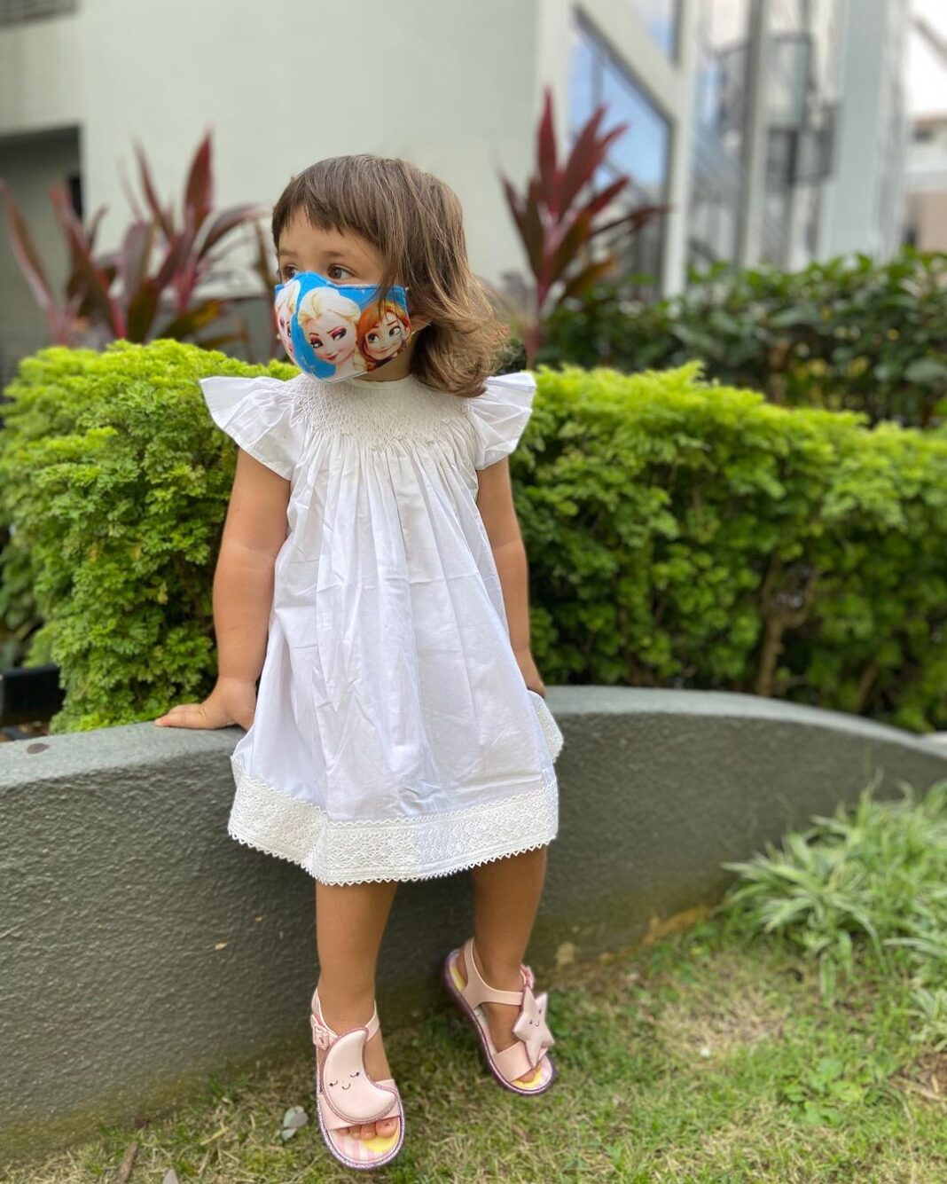 Lisa Ray Instagram - We wore our lovingly handcrafted @liz.jacob.designs dresses for our first day of Baby Ballet. Don’t miss our matching masks. Sandals @melissashoesindia #soufflé #SufiandSoleil #sustainablekidsclothes #Bangalore #Singapore