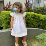 Lisa Ray Instagram - We wore our lovingly handcrafted @liz.jacob.designs dresses for our first day of Baby Ballet. Don’t miss our matching masks. Sandals @melissashoesindia #soufflé #SufiandSoleil #sustainablekidsclothes #Bangalore #Singapore