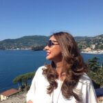 Lisa Ray Instagram - Warning: this post may induce nauseating nostalgia, an attack of fun loving, free spirited travel FOMO, force majeure resentment and a sensation of being shipwrecked without hope of rescue. Never mind. I’m posting it anyways. . Circa: before Corona. The view from the roof of the Grand Bristol Hotel in Rapallo. Portofino shimmers in the distance. #wewereglamoroustravellersonce