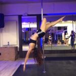 Malvika Sharma Instagram - Never mess with a Woman who hangs upside-down for fun 😉 #malvikasharma #poledance #malvikasharmaofficial #dance #poledancer #love #polelove #dancelove #strongwomen #strongnotskinny #polefitness