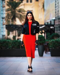 Nargis Fakhri Instagram - Strike a pose. ⚡️
.
.
.
. .
@kashifrashid .
 @malihajkhan .
 The red dress with jacket 
Styled by : @rubyalgayar  @anara_omarkhan
Dress : @americanvintage_officiel
Jacket by : @dsquared2 
Sunglasses @ @dinazakiofficial . .
#strikeapose #fiercelook #outfitoftheday #fashionblogger #lookoftheday #streetstyle #fashionista #instastyle #whatiwore #fashiongram