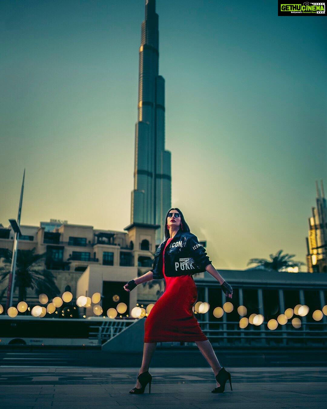 Nargis Fakhir Instagram - Just a girl on the go. . . . . Photographer - @kashifrashid Mua & Hair - @malihajkhan Styled by : @rubyalgayar @anara_omarkhan Dress : @americanvintage_officiel Jacket @dsquared2 Sunglasses @dinazakiofficial . . . . #mydubai #iconic #punkrock #highheels #hudabeauty #wakeupandmakeup #glow #bossbabe #girlgang #bosswomen