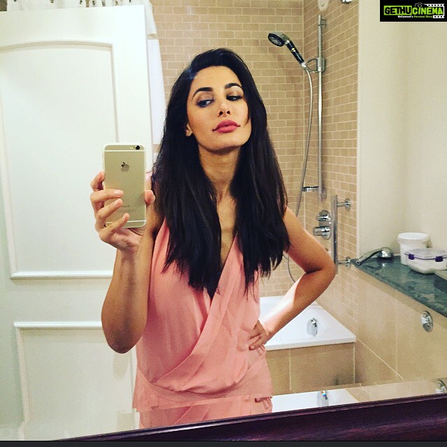 Nargis Fakhir Instagram - Wearing PINK for Breast Cancer Awareness! Early detection provides a 98% chance of recovery. A regular two-minute self-examination will help diagnose the disease in its early stages, providing a 98% chance of recovery. #PinkSelfie @ElleIndia @elleindiaofficial my mom has gone through it and I was by her side, thank goodness it's been about 10/11 years now and she is cancer free!! Thanks to early detection and the proper care! Pls take care of yourselves!