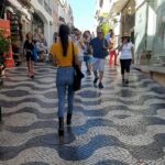 Natasha Suri Instagram - Follow me into the sunset..😍 The Suri Sisters are at Caiscais in Lisbon in Portugal in Europe here. Pebbled pathways are unique to Portugal. Beautiful country. #Portugal #EuropeanEscapades #natashasuri