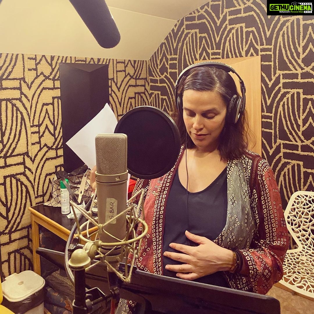 Neha Dhupia Instagram - Dubbing for an action film in your third trimester 🤰is a different ball game … ofcourse I had no idea when I was shooting that I would be coming back to dub some bits in this state … Somewhere between the breathlessness and the back ache and the burps 😆 the only way out was to sit and get thru as opposed to always standing and recreating the force. I love dubbing … it gives you the opportunity to re create so much in such a controlled environment but when you are this pregnant 🤰 one just has to do the same things differently. This ones for the cast n crew on #sanak … thank you for making me a part of this and now can’t wait for everyone to watch it …. ❤️ @mevidyutjammwal @kanishk.varma #vipulshah @iamroysanyal @rukminimaitra @sunshinepicturesofficial @aashin_shah