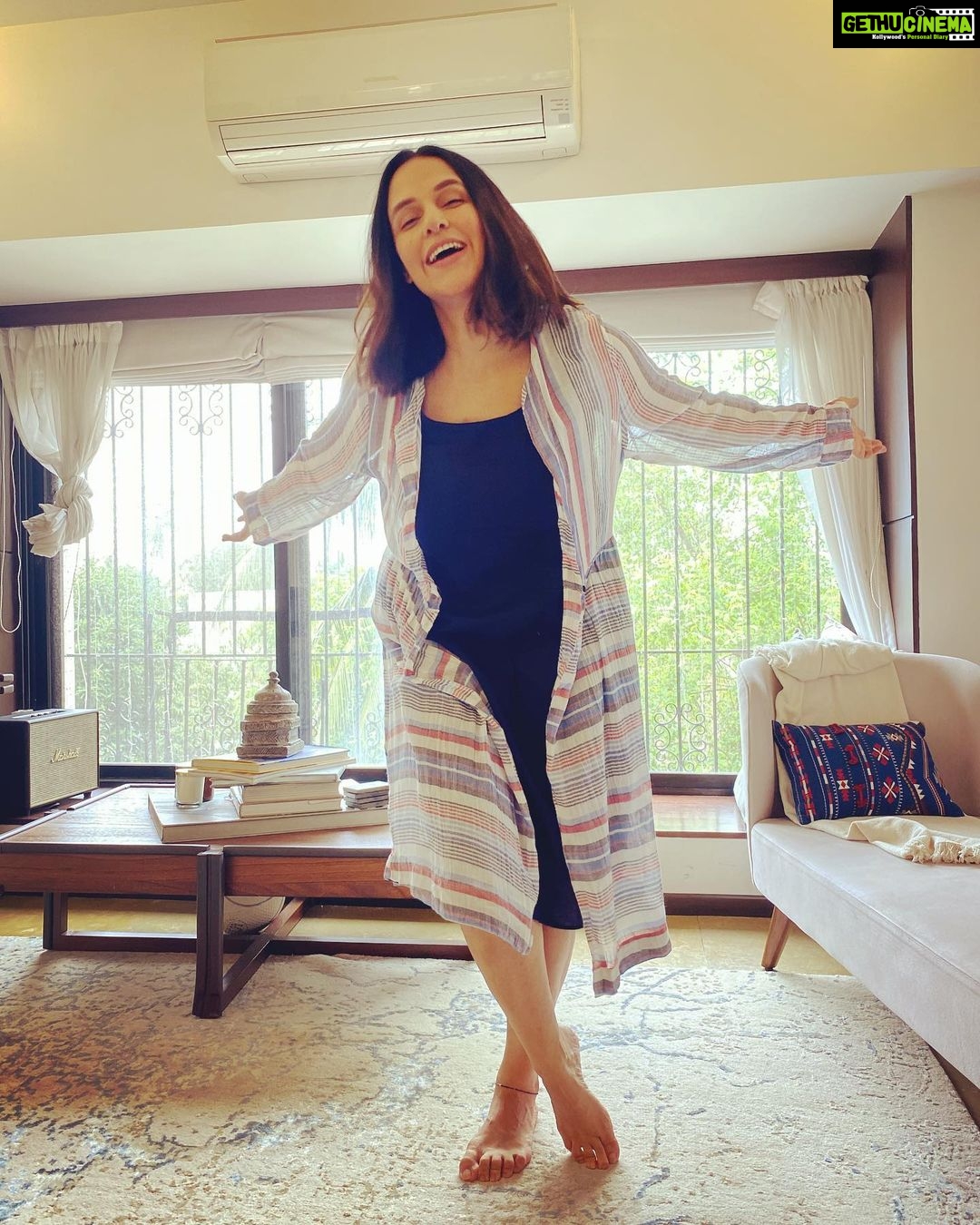 Neha Dhupia Instagram - Me leaping forward to give my little one a hug... perks of #workfromhome 🏠 💻