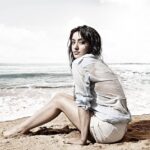 Neha Sharma Instagram - 🌊I just want to sit in-front of the ocean for a little while...till then #throwingitback #nostalgia