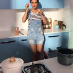 Neha Sharma Instagram - This happens to be my fav place..fooling around between takes..#kitchenlife #bts #spawake 👩🏻‍🍳