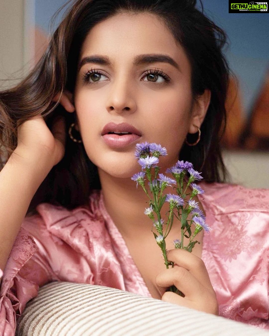 Nidhhi Agerwal Instagram - Check on yourself as much as you check Instagram 🦋🌂🦄🌸☂️🍬🎆🔮🧬🎀💜