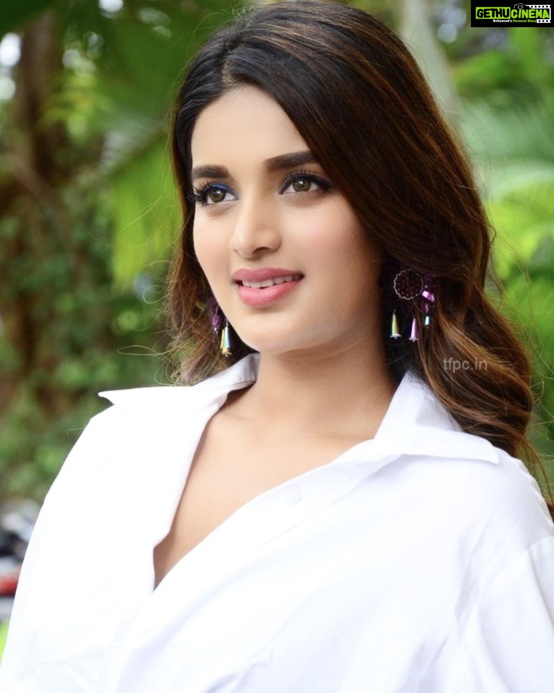 Nidhhi Agerwal Instagram - I usually donβt experiment much but can you see my blue eyeliner in this picture ππ #ismartshankar #pressmeet