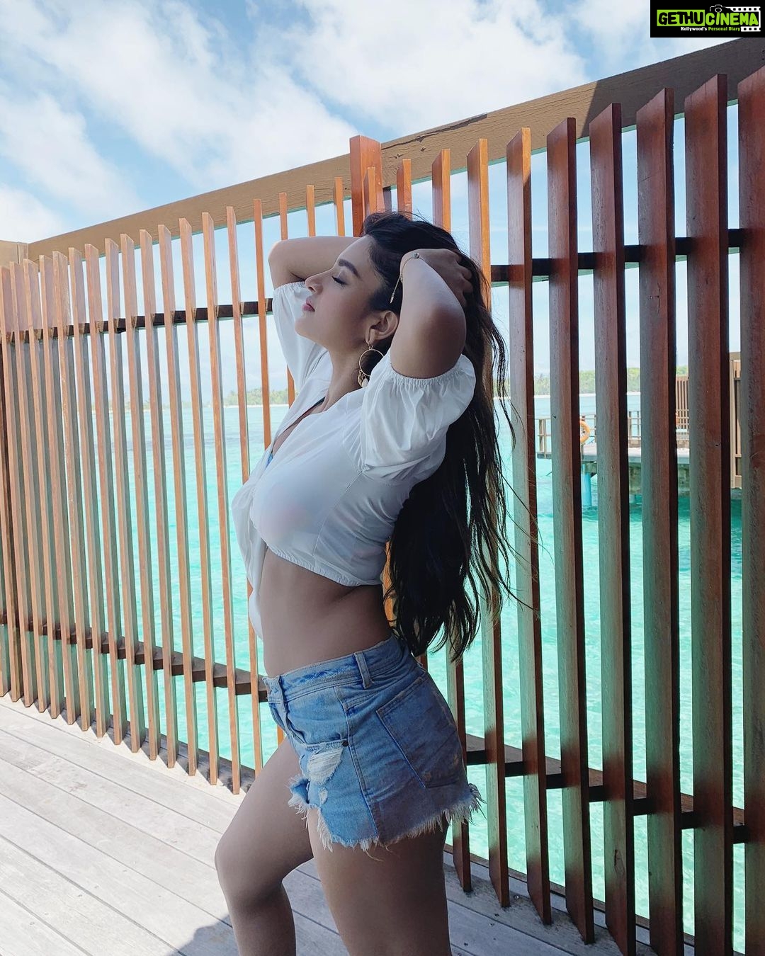 Nidhhi Agerwal Instagram - Good morning 🦋 song out today at 11am #maldives #beach #tan #ismartshankar #blues Maldives