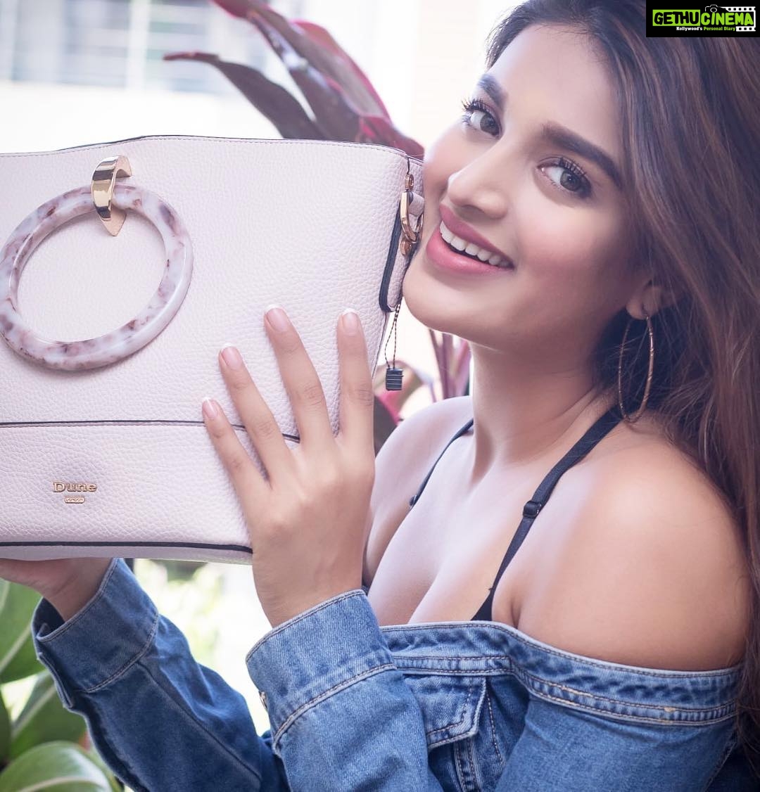 Nidhhi Agerwal Instagram - Loving my new bag from @dune_london_india 💁🏻♀️👜 #clothesareoverrated