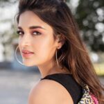 Nidhhi Agerwal Instagram - Time changes a lot of things.. grow with it or just go with it 🐠🐯 quote credit @ram_pothineni