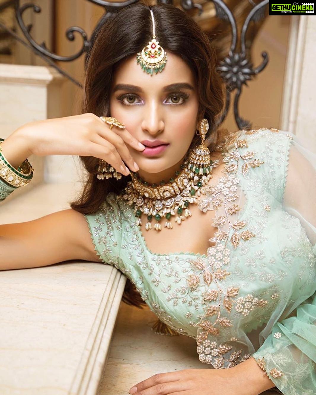 Nidhhi Agerwal Instagram - Me on a Saturday night 💁🏻♀️ @youandimag Outfit: @anushreereddydesign from @angasutrastyle Jewellery: @Musaddilalgemsjewels Makeup and hair: @officialsandysartistry Styled by @officialanahita Pic: @nikkhil_bareli