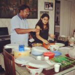 Nivetha Thomas Instagram - Daddy daughter duo diving into food wen brothers' busy cutting his cake! ;) Hahaa kidding!
