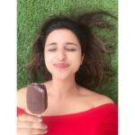 Parineeti Chopra Instagram – Lying on the grass, eating ice-cream kind of day!!! 🍫🍦🌈 @vadilalicecreams #WhatsYourWajah #TheBestPartofEveryday #VadilalIceCreams