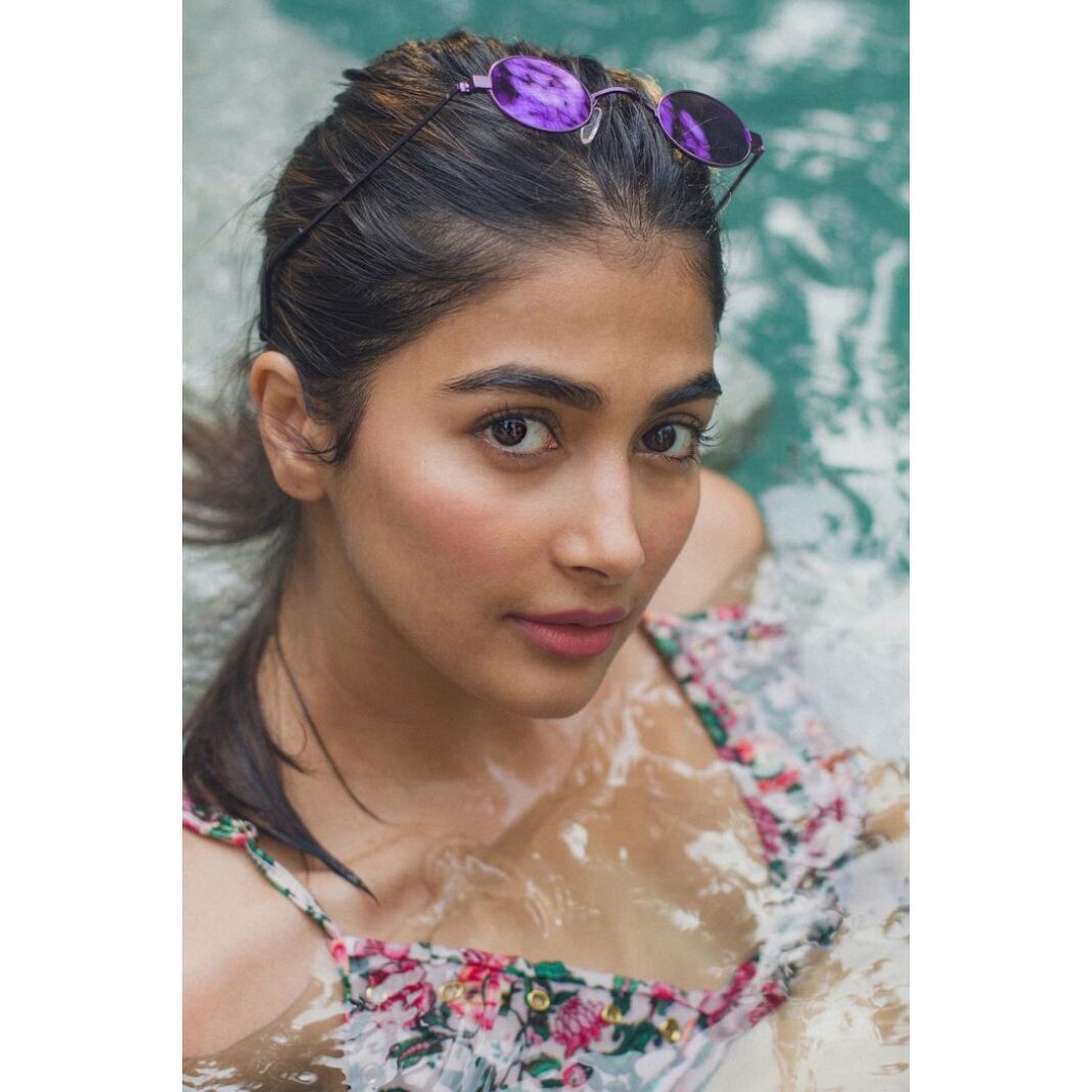 Pooja Hegde Instagram - The calm before the storm 😉 That one last leisurely dip in the pool before I start shooting for the films lined up for this year ❤️ #letsdothis