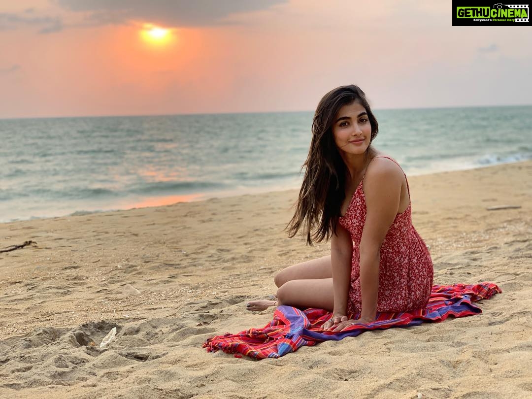 Pooja Hegde Instagram - All I could do was try and immortalise this sunset with a picture ❤️ #sunsandsea #peace