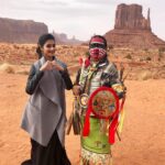 Pooja Hegde Instagram – Travel the world.Understand different cultures.Be inspired by the beauty everywhere ❤️ Was absolutely fascinated by the colours on his tribal outfit.Beautiful ❤️🌈 #navajo #traveldiaries #beautyindiversity #inbetweenshots Monument Valley Navajo Tribal Park