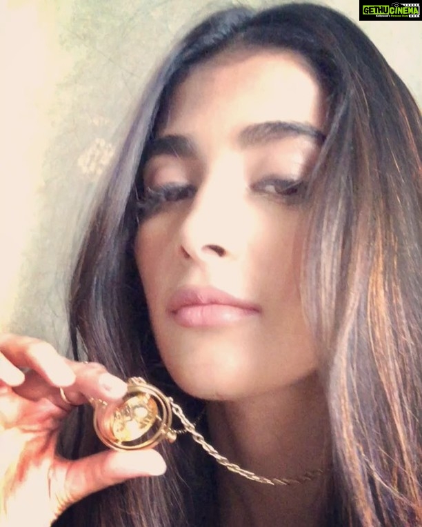 Pooja Hegde Instagram - While playing with my time turner I wondered..If you could turn back time,would you do it,and what for? Would you change,better or just re live something?..Lemme know π #midnightmusings #timeturner #justathought