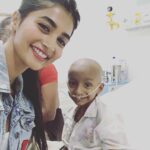 Pooja Hegde Instagram - Inspite of everything,through all his pain,he smiled at me..and omg,he just made my day 😍 #learningfromkids #warriors ❤️