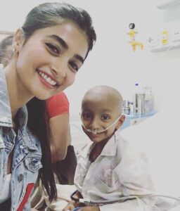 Pooja Hegde Instagram - Inspite of everything,through all his pain,he smiled at me..and omg,he just made my day 😍 #learningfromkids #warriors ❤️