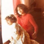 Pooja Kumar Instagram - My cousin Archana and I are looking at the new fresh snow and decide to stay indoors. It was way too cold to go outside! #memorieslastforever #sisterlove👭 #flashbackfriday #springishere @archana.patton