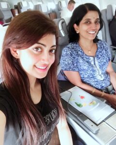 Pranitha Subhash Instagram - with mommy ✈️