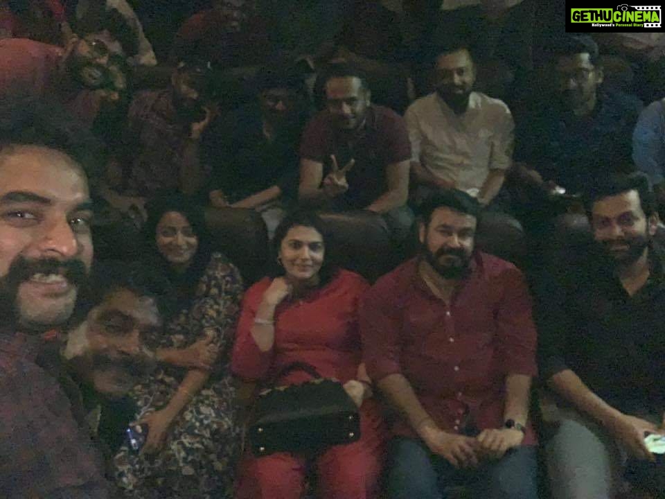 Prithviraj Sukumaran Instagram - Last year this time, I had just finished loading Lucifer on all platforms and checked the out on each one of them. It was the culmination of a 3 month long, frantic, day and night post production schedule. There was no way I could have made it on time without the constant support of my cinematographer, directorial, edit, sound, DI and VFX team. One year since, the world is a lot different. And I’m a good 30 odd kilos lighter! These are tough times..and I guess memories that inspire you are more important than ever. The next morning, groggy and sleep deprived, Supriya and I went to Kavitha single screen in Ernakulam to see the first day first show of my directorial debut. And Lalettan gave me one of the best surprises of my lifetime by joining us amidst a humungous crowd. It’s been a fairly long journey in cinema..but 28/03/19 will be special till I die! Stay safe folks. ❤️ #Empuraan