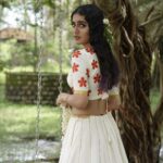 Priya Varrier Instagram - 🌺 Stylist : @asaniya_nazrin Photography : @jeesjohnphotography MUAH : @samson_lei Outfit : @poornimaindrajith Jewellery : @francisalukkas Location : @kondai_lip_resort Costume assistant : @ashwathy_sethunath