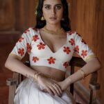 Priya Varrier Instagram - 🌺 Stylist : @asaniya_nazrin Photography : @jeesjohnphotography MUAH : @samson_lei Outfit : @poornimaindrajith Jewellery : @francisalukkas Location : @kondai_lip_resort Costume assistant : @ashwathy_sethunath